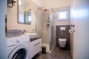 Kúpeľňa v ubytovaní Apartments Up&Up + 35 fotografií