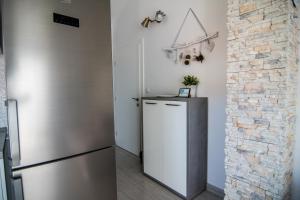 Kuchyňa alebo kuchynka v ubytovaní Apartments Up&Up