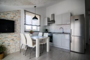 Kuchyňa alebo kuchynka v ubytovaní Apartments Up&Up