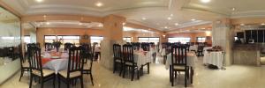 Een restaurant of ander eetgelegenheid bij Washington Hotel