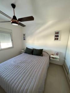 Voodi või voodid majutusasutuse Cozy and modern apt in Cordoba toas