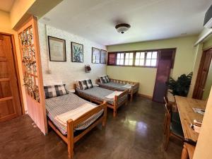 Postel nebo postele na pokoji v ubytování T-House BKK 2Floors near BTS with swimming pool and free Wifi