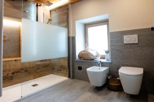 Ett badrum på Le Camere di Naturalys