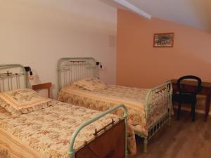 Posteľ alebo postele v izbe v ubytovaní Gîte "Stella" du Moulin de la Batteuse