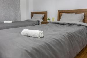 Postel nebo postele na pokoji v ubytování Studio Mélange in Loutraki DT