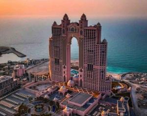 an aerial view of the palace of the dead in front of the ocean at home in Abu Dhabi