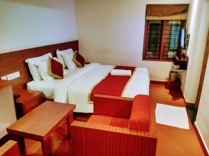 Pearlspot Hotel客房内的一张或多张床位