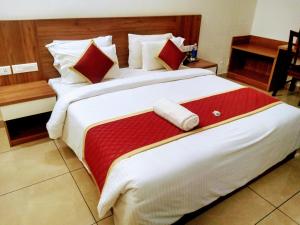 Pearlspot Hotel客房内的一张或多张床位
