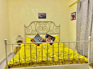 Uma cama ou camas num quarto em Putravilla Condominium Lovely & Spacious with Public Pool