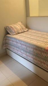 Ein Bett oder Betten in einem Zimmer der Unterkunft Luxo apartamento In Copacabana