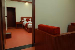 Pearlspot Hotel客房内的一张或多张床位