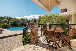 The swimming pool at or close to Olive Tree Villas