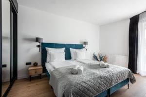 Posteľ alebo postele v izbe v ubytovaní InPoint Drive Inn - Stay&Park Free