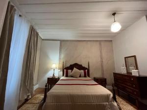 Cama ou camas em um quarto em Alojamento VINTAGE BAIXA - TOMAR