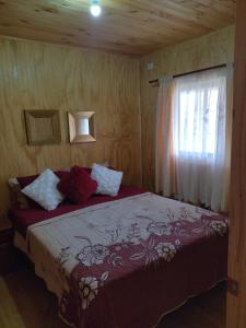 Postel nebo postele na pokoji v ubytování Cabaña Kin + 2 fotografie