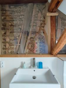 a bathroom being remodeled with a sink and a ceiling at Schlaf mal im Denkmal in Birstein