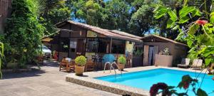 A piscina localizada em Pousada Macunaima ou nos arredores mais 30 fotos