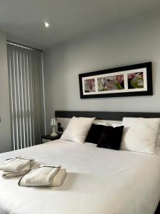 A bed or beds in a room at Apartamento - Riba De Sella
