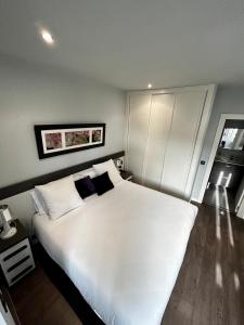 A bed or beds in a room at Apartamento - Riba De Sella