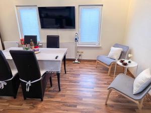 TV a/nebo společenská místnost v ubytování Apartement am Schloss Pillnitz