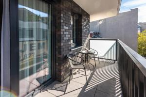 Balkón alebo terasa v ubytovaní InPoint Drive Inn - Stay&Park Free