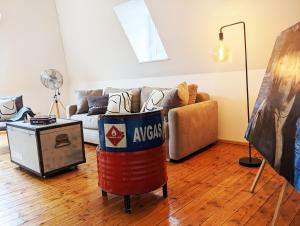 a living room with a couch and a table at Mosel-Loft in Bernkastel-Kues