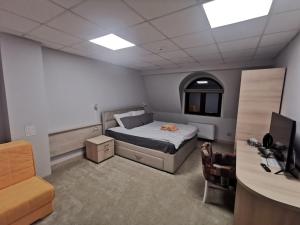 Letto o letti in una camera di City SMART