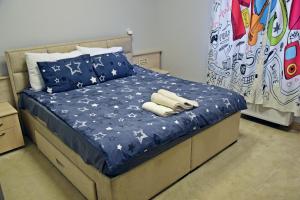 Letto o letti in una camera di City SMART