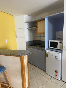 Kuchyň nebo kuchyňský kout v ubytování IATE PLAZA HOTEL Calçadão Frente Mar 603