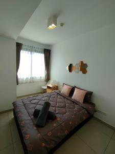 เตียงในห้องที่ unixx seaview