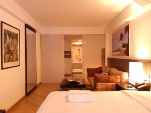 Кровать или кровати в номере Somewhere to Escape - Hometel