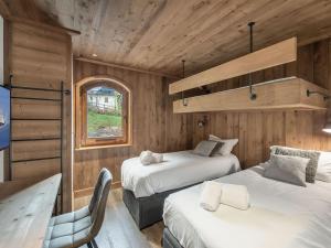 Posteľ alebo postele v izbe v ubytovaní Charmant appartement à Courchevel Le Praz, proche des pistes, 4 adultes | 1 enfant, services inclus - FR-1-568-22