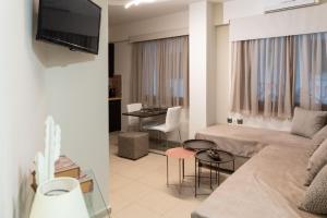 TV a/nebo společenská místnost v ubytování Pasiphae Lux Apartment Downtown
