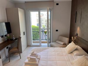 Ένα ή περισσότερα κρεβάτια σε δωμάτιο στο Welcome Cagliari