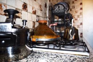 Kuchyň nebo kuchyňský kout v ubytování Appartement Afgo Ouarzazate