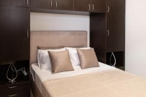 Postel nebo postele na pokoji v ubytování Pasiphae Lux Apartment Downtown