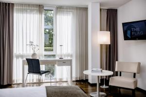 Llit o llits en una habitació de THE FLAG Zürich