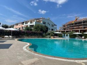 The swimming pool at or close to ILIA'S House Porto Rotondo