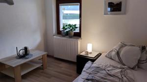 Postel nebo postele na pokoji v ubytování Haus Heimat & Appartement