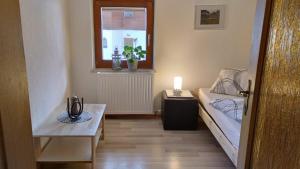 Postel nebo postele na pokoji v ubytování Haus Heimat & Appartement