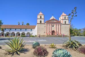 a church with two towers and cacti in front of it at Santa Barbara Studio Near Downtown and Beaches in Santa Barbara