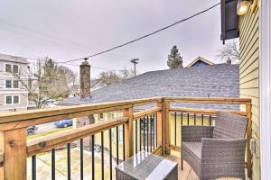 a balcony with two chairs and a roof at Pet-Friendly Oregon Abode - Furnished Balcony in Portland