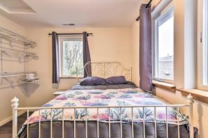 a bedroom with a bed and a window at Pet-Friendly Oregon Abode - Furnished Balcony in Portland