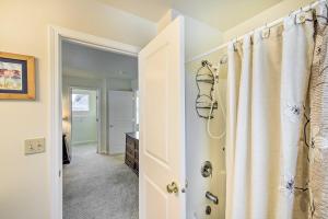 a bathroom with a shower with a shower curtain at Pet-Friendly Montana Getaway Near Kayaking! in Missoula