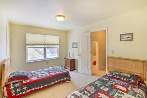 a bedroom with two beds and a window at Pet-Friendly Montana Getaway Near Kayaking! in Missoula