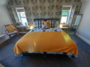 Postel nebo postele na pokoji v ubytování Lawriestone Guest House
