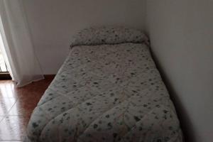 A bed or beds in a room at Casa Agner