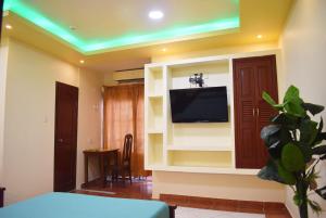 TV a/nebo společenská místnost v ubytování Hostal Galápagos - Guayaquil