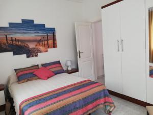 Apartur - Céntrico apartamento junto a la playa 객실 침대