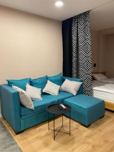 Χώρος καθιστικού στο Roshka Apartment #304